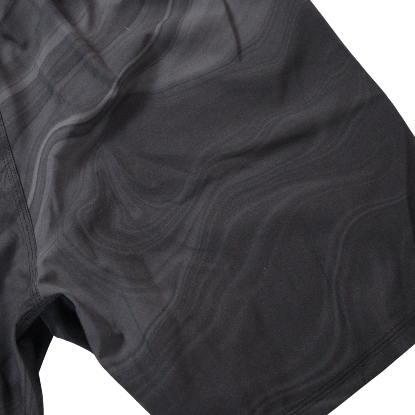 close up of marble black nogi shorts