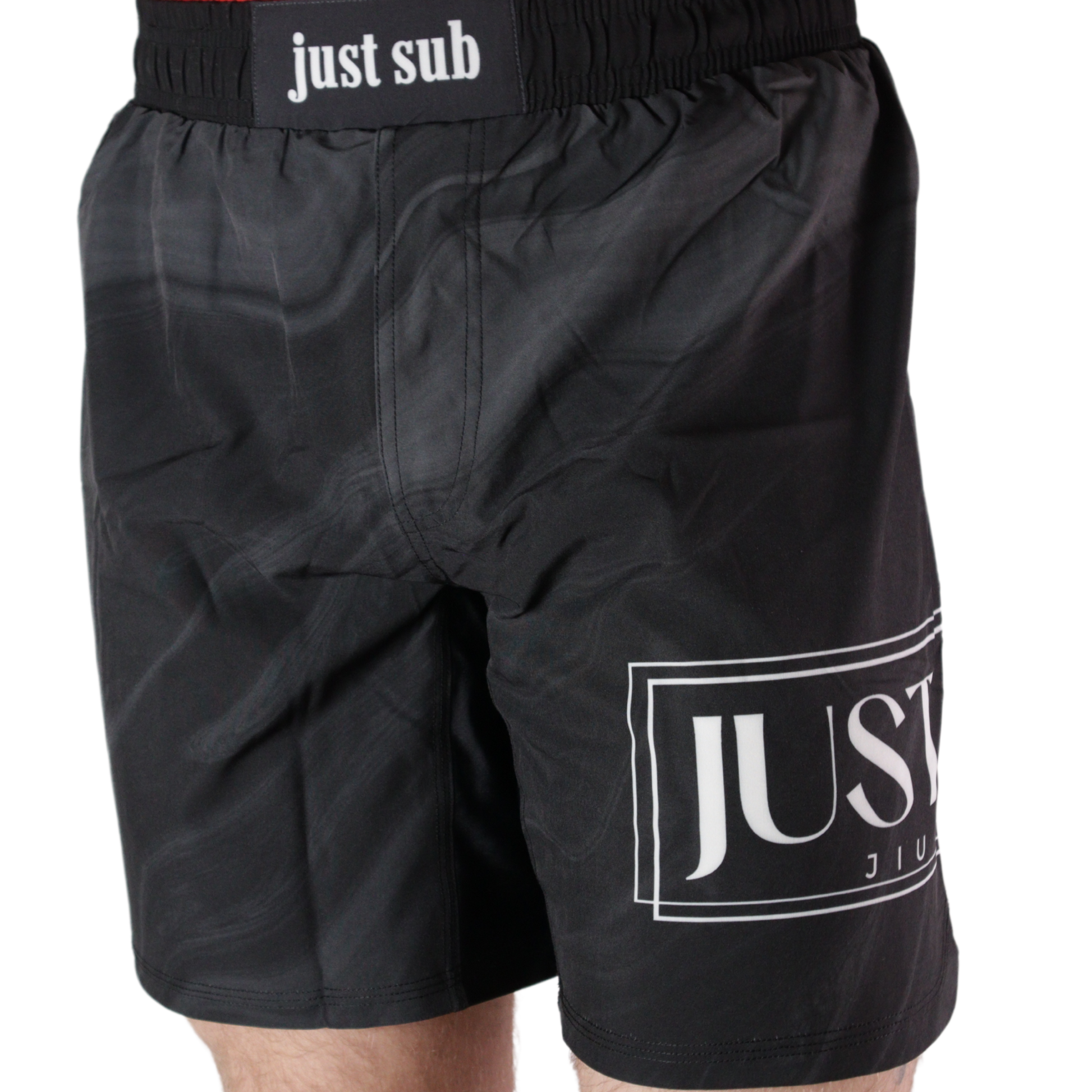 model wearing marble black no gi shorts front view
