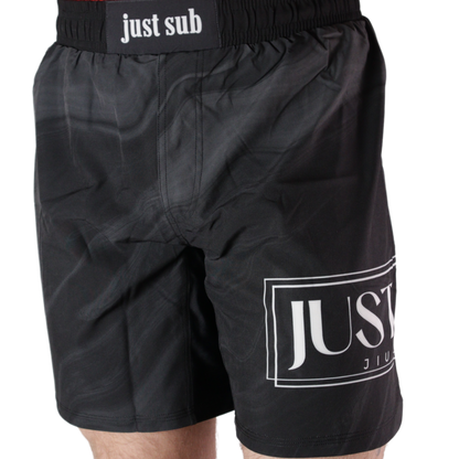 model wearing marble black no gi shorts front view
